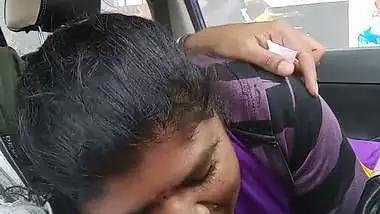 Telugu woman gives a desi blowjob to her man in a car